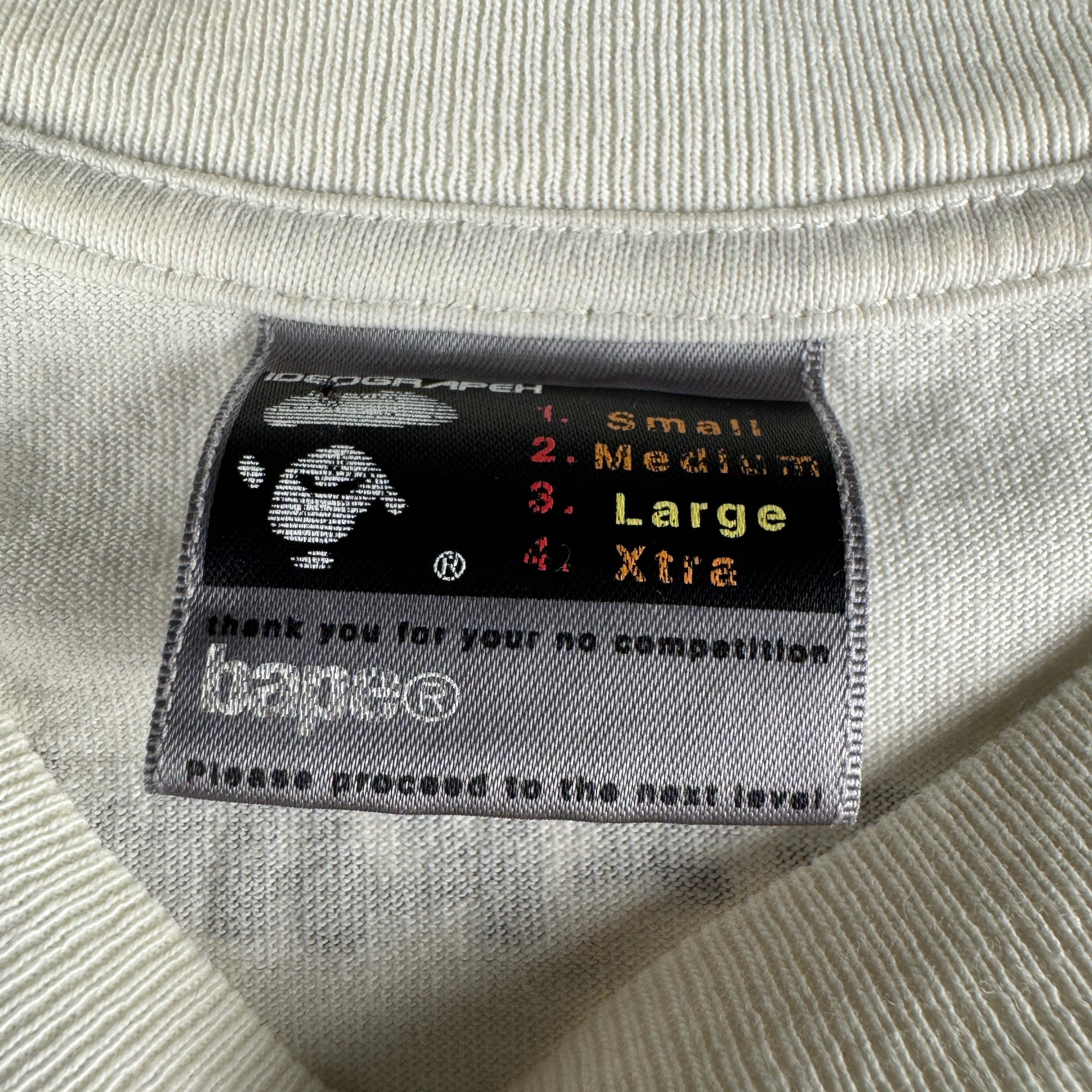 BAPE x Kaws Face White Tee (L)