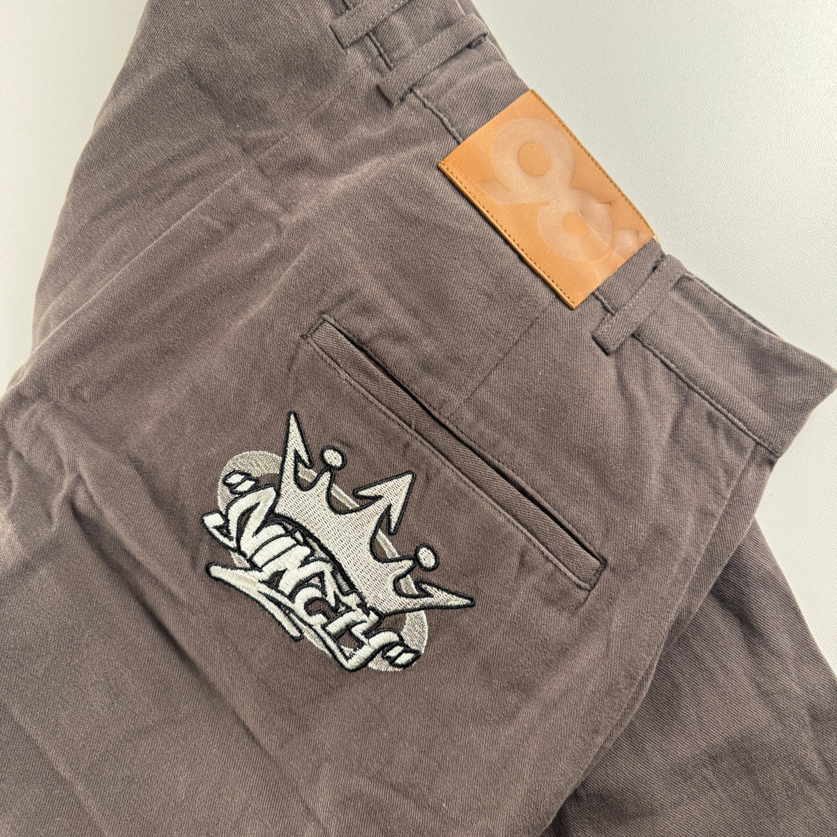 9090 Brown King Logo Chino Pants (L)