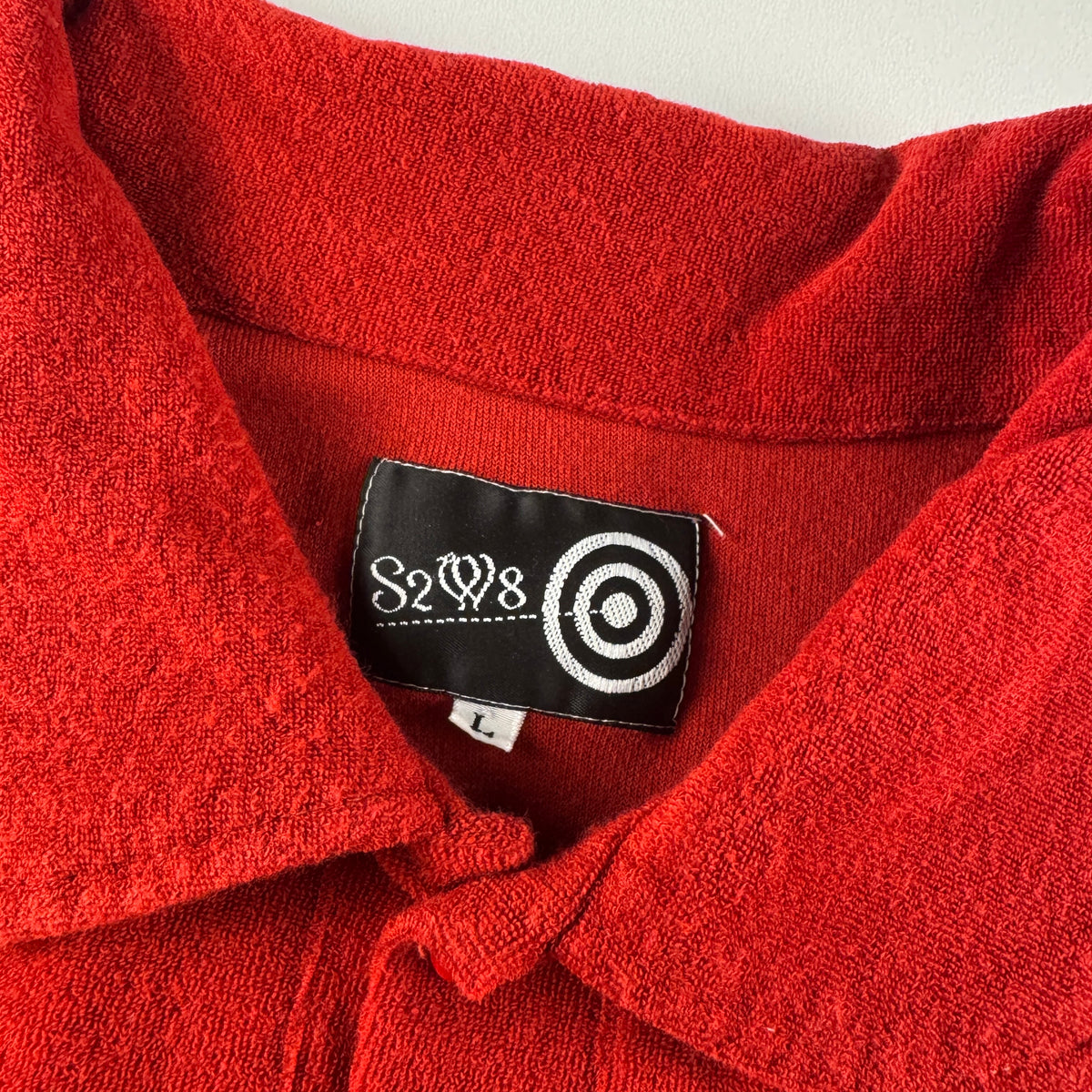 South2 West8 Polo Shirt (L)