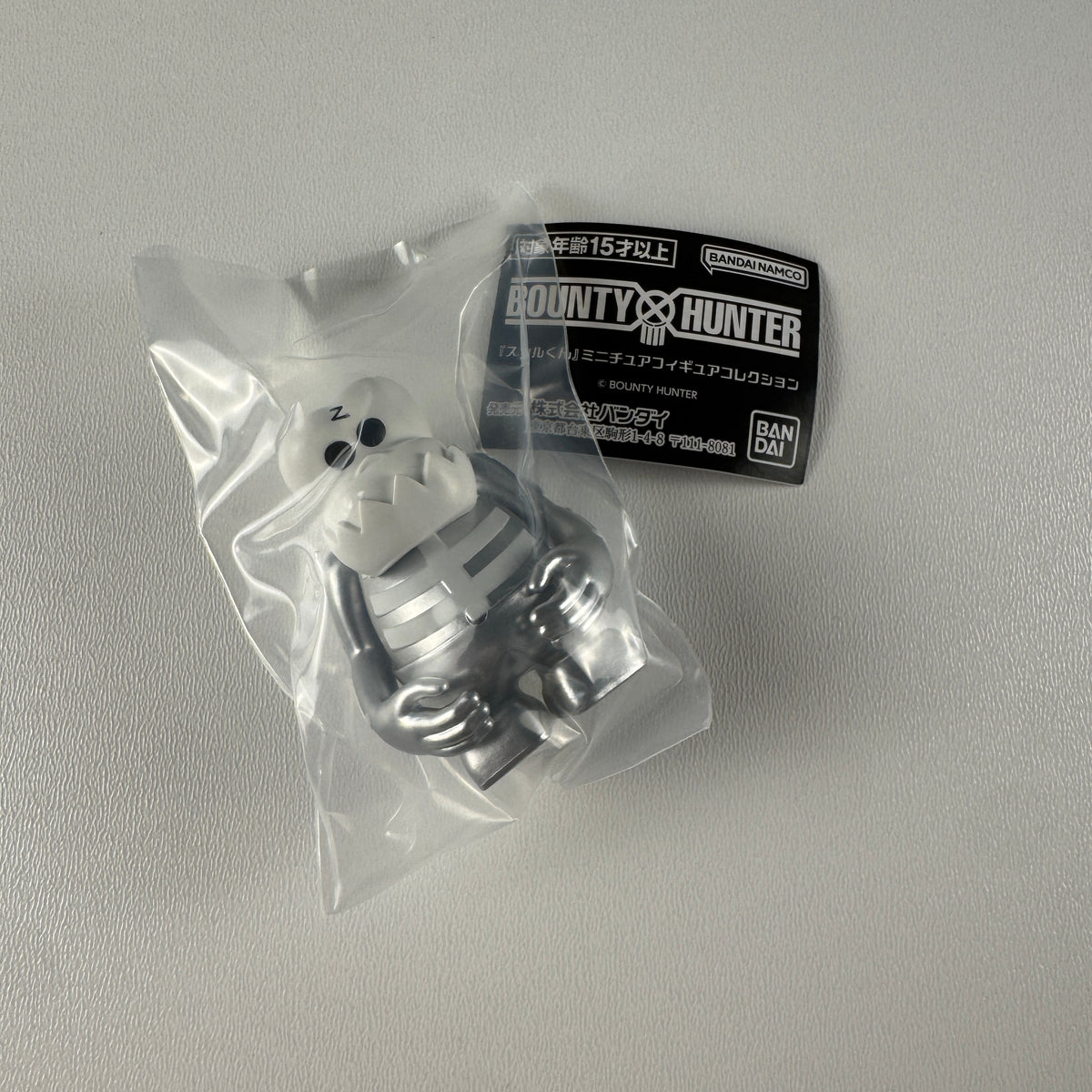 Bounty Hunter Skull-Kun Miniature Gashapon Figure - Silver