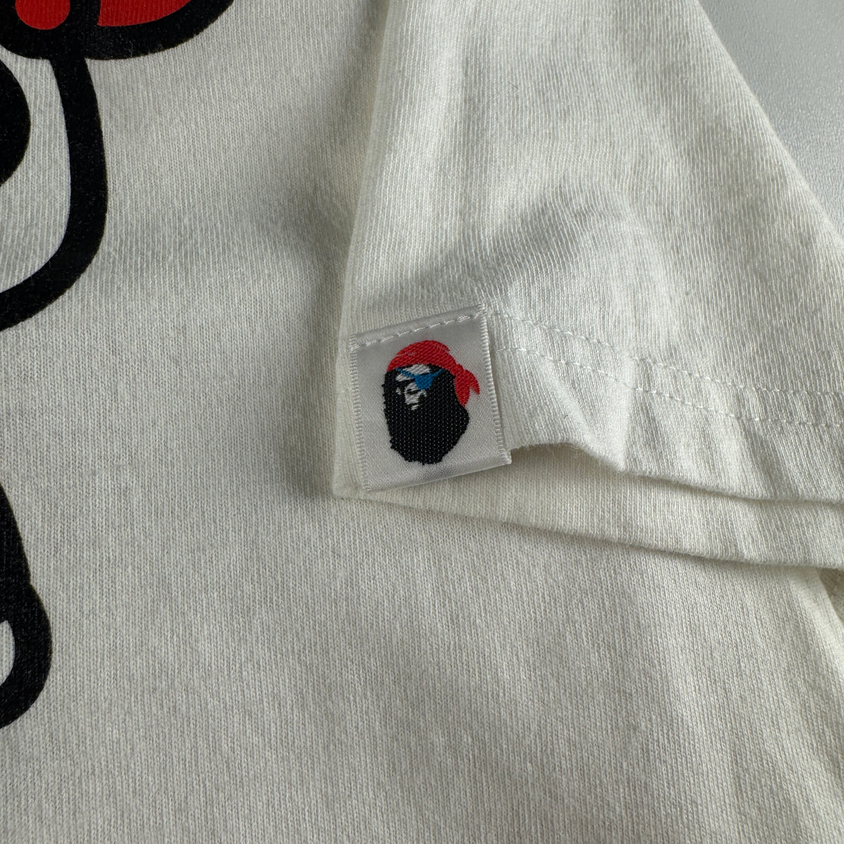 BAPE Baby Milo Pirate Store White Tee (M)